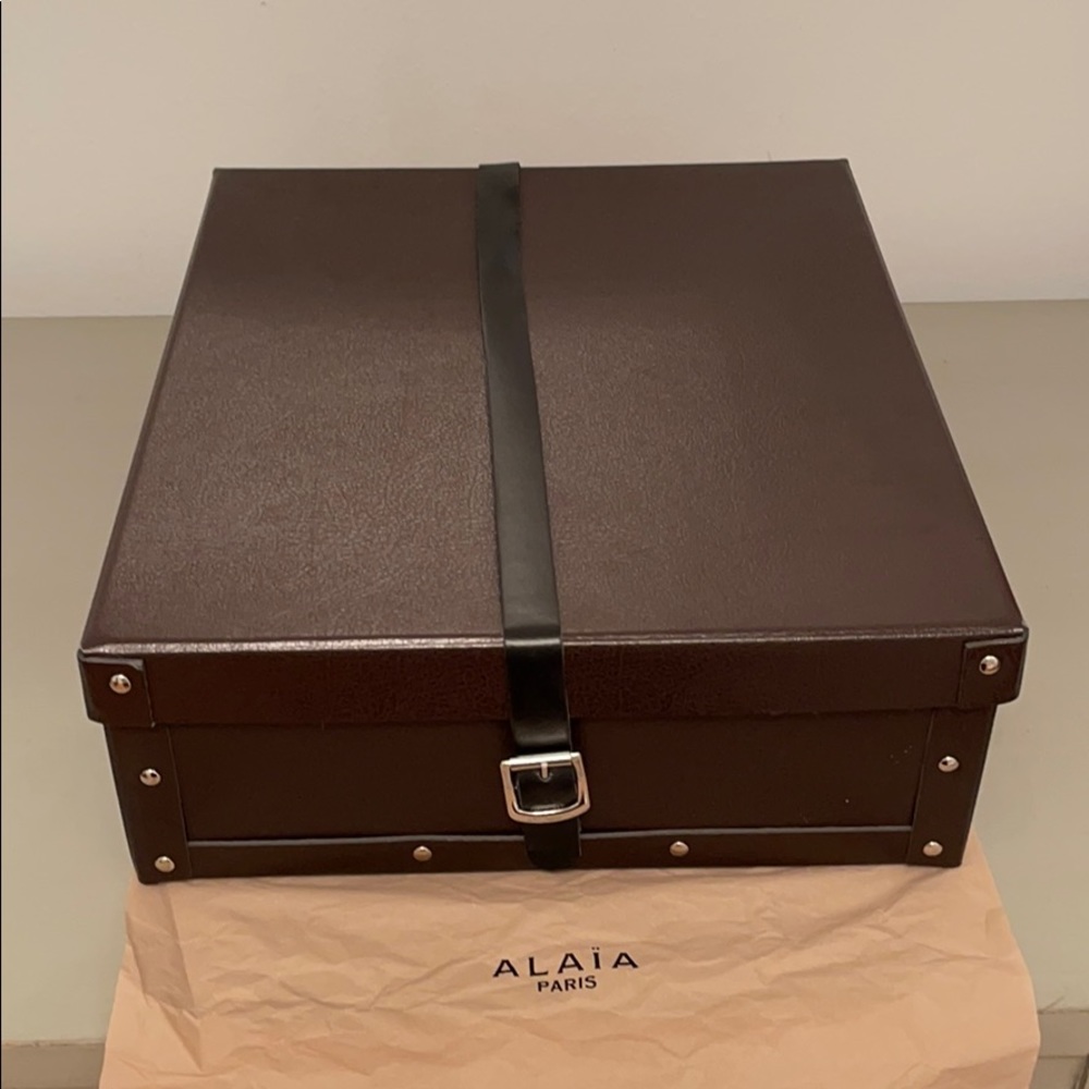Alaia boot box with leather strap